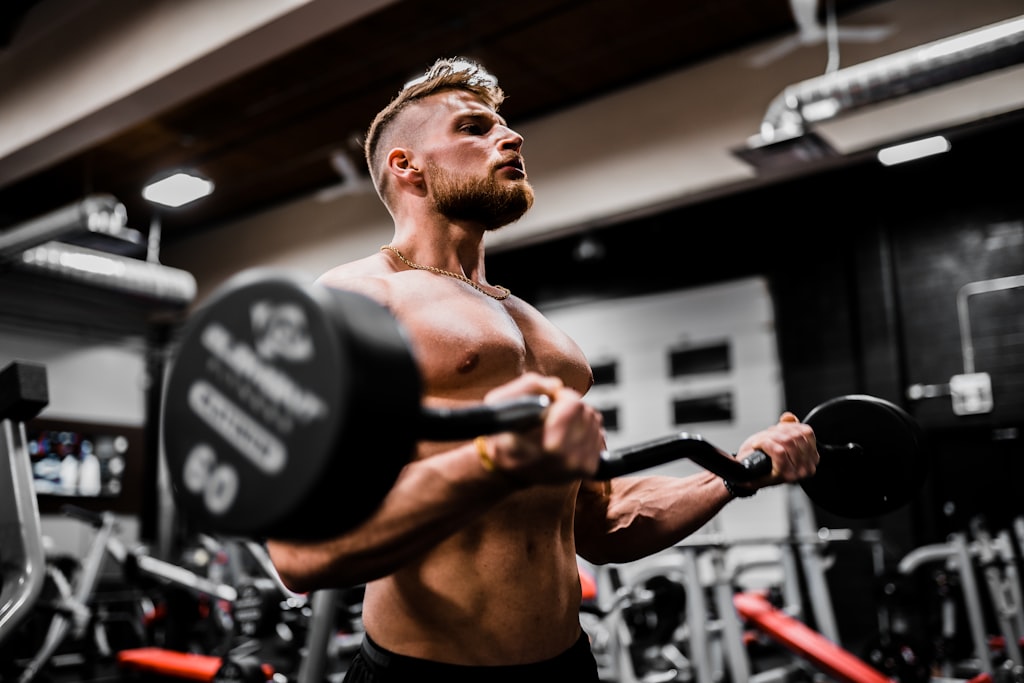 Build Muscle goal image with athlete and supplements
